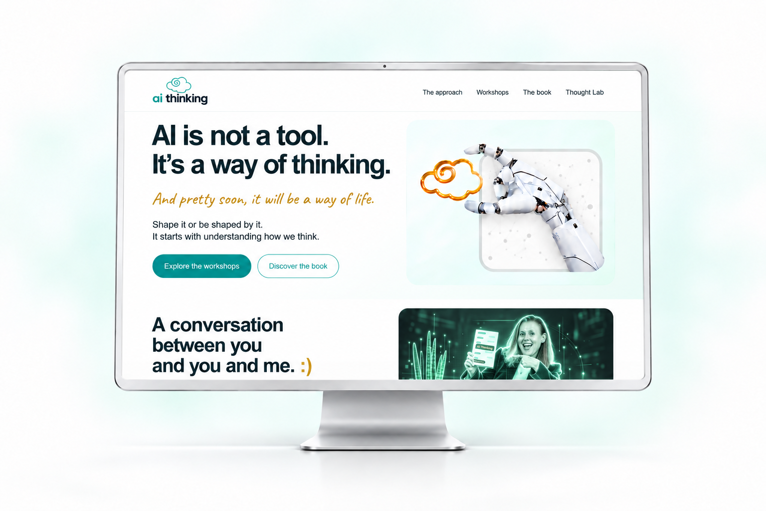 AI Thinking homepage displayed on a silver computer monitor